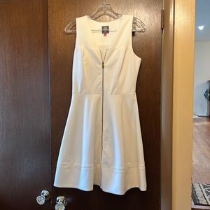 Ivory dress, comfort and style. Worn with cropped jacket or sweater.  Lined.
